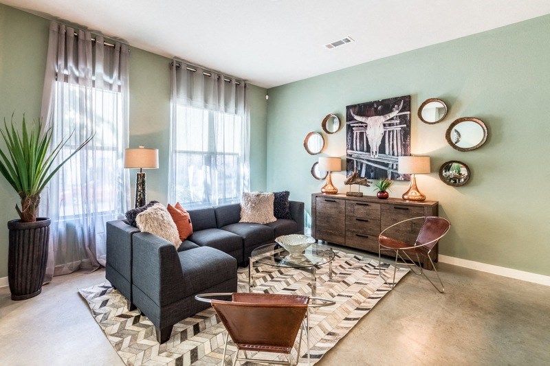 a living room with a couch and a table