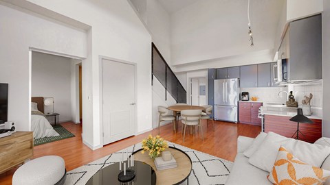 A modern living room with a white sofa and a coffee table.