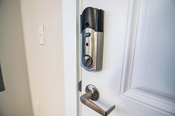 interior model front door with key-less smart lock feature - Photo Gallery 7
