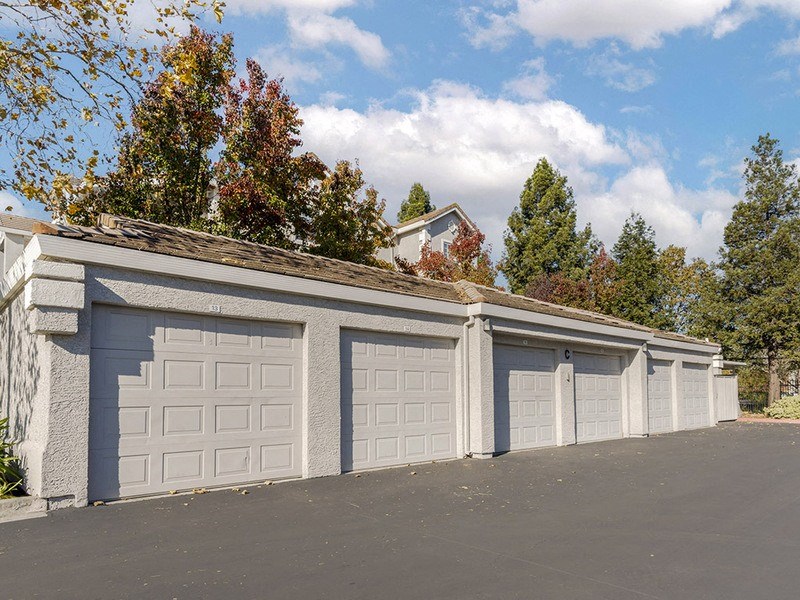 a garage with a row of garage doors