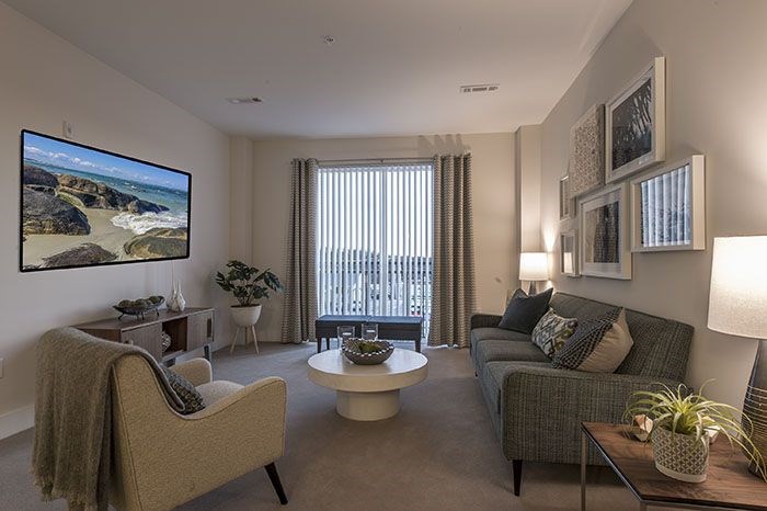 a living room with a couch and a table