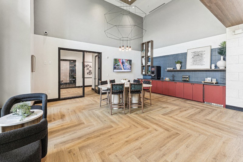 a living room with a dining room and a kitchen