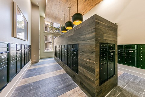 a large locker room with vaulted ceilings and a wall of lockers