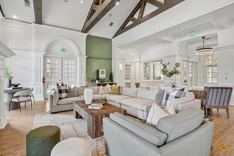 the living room is open to the dining room and kitchen