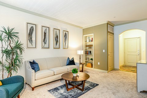 a living room with a couch and a coffee table