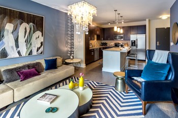 model home living room overlooking kitchen island - Photo Gallery 3