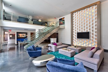 resident two story lounge with seating - Photo Gallery 6