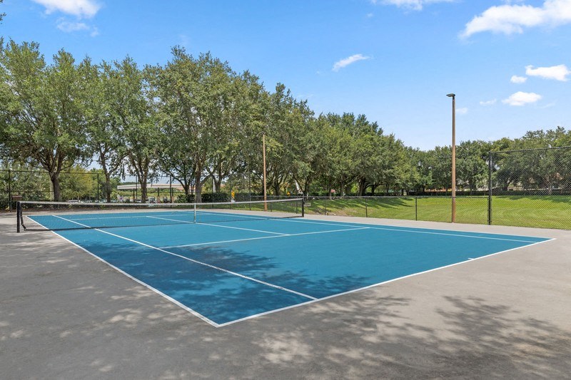 a tennis court at the hampton center apartments in hampton va