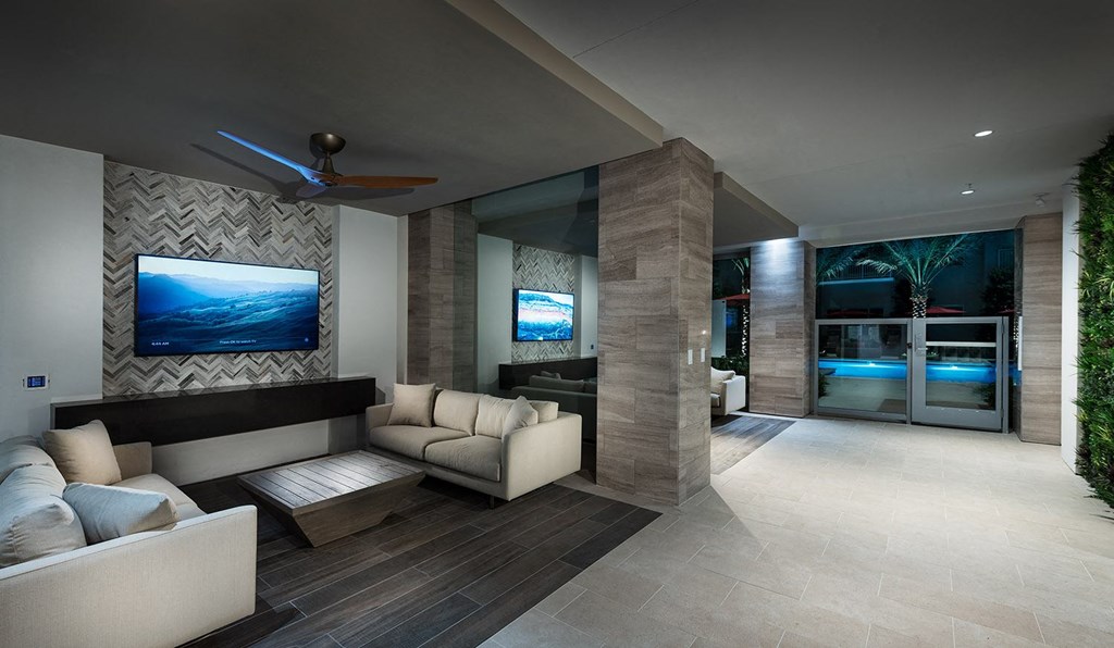 a living room with a couch and a tv