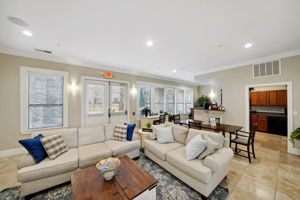 a room with a white couch and a coffee table