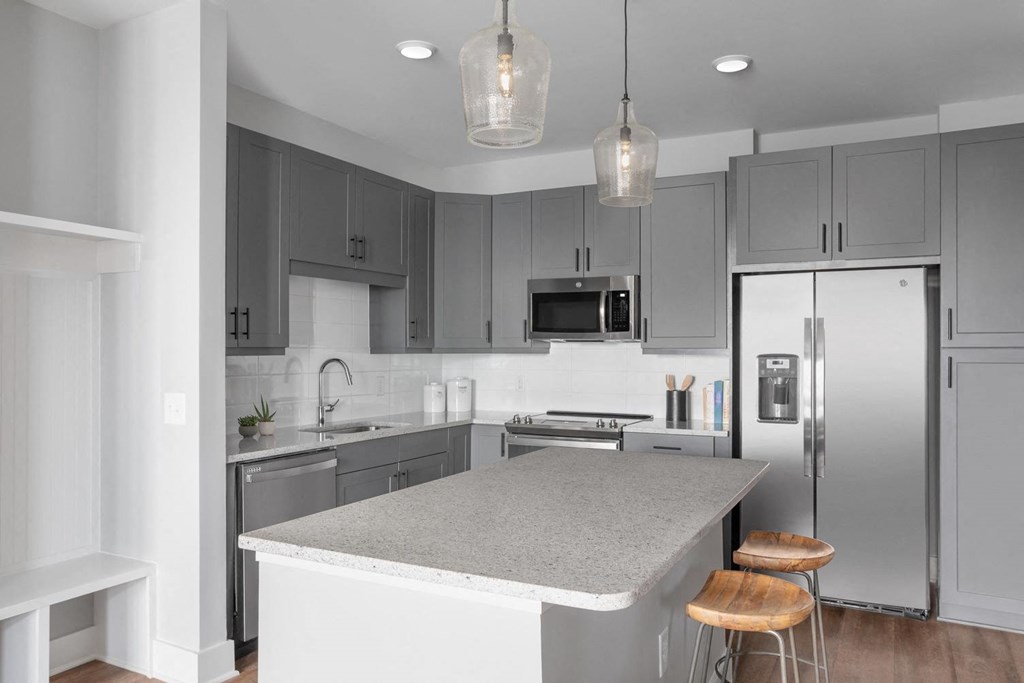 Contemporary large island kitchens and stainless steel appliances