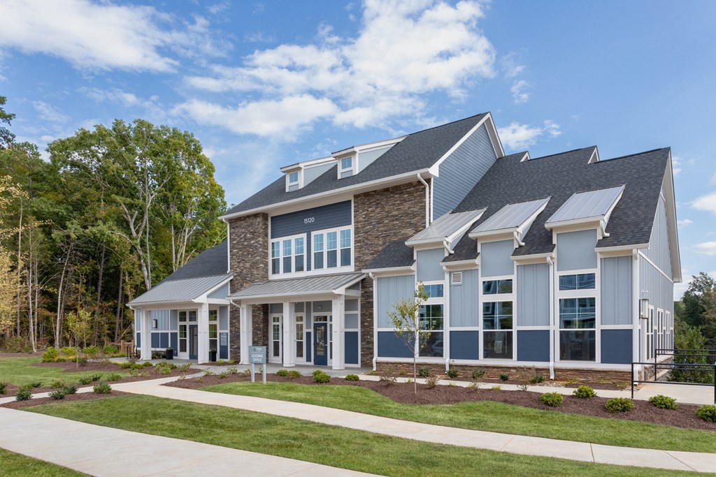 exterior building image of leasing office and clubhouse