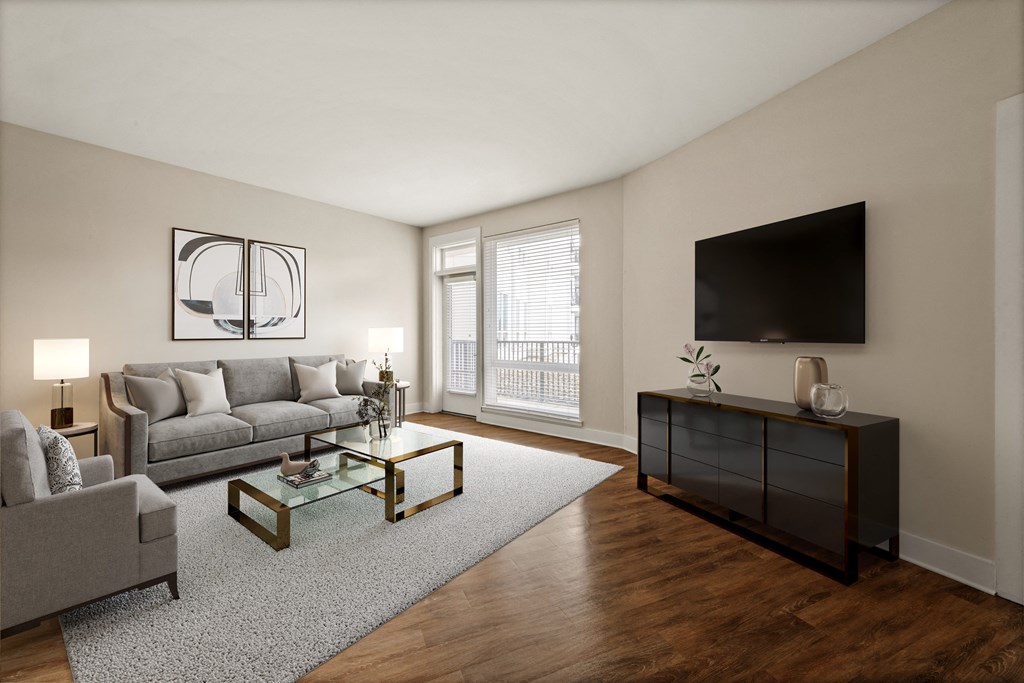 a living room with a couch and a tv