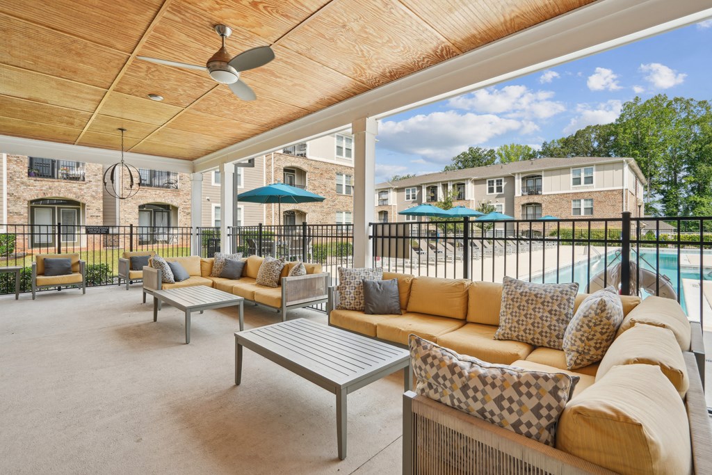 the preserve at ballantyne commons covered patio with couches and tables