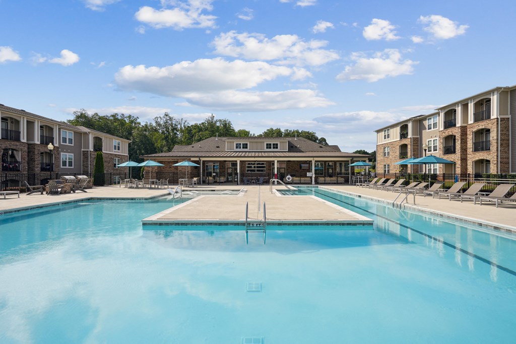 swimming pool with lounge chairs