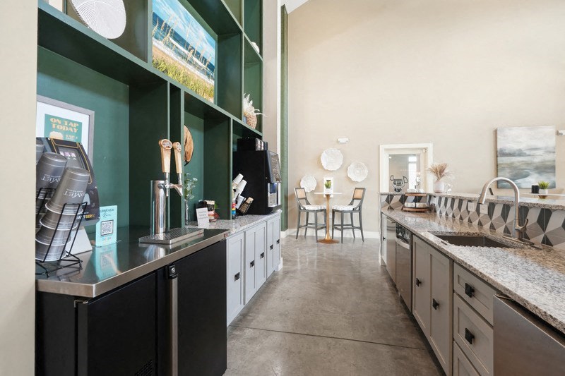 a kitchen with a counter top and a sink