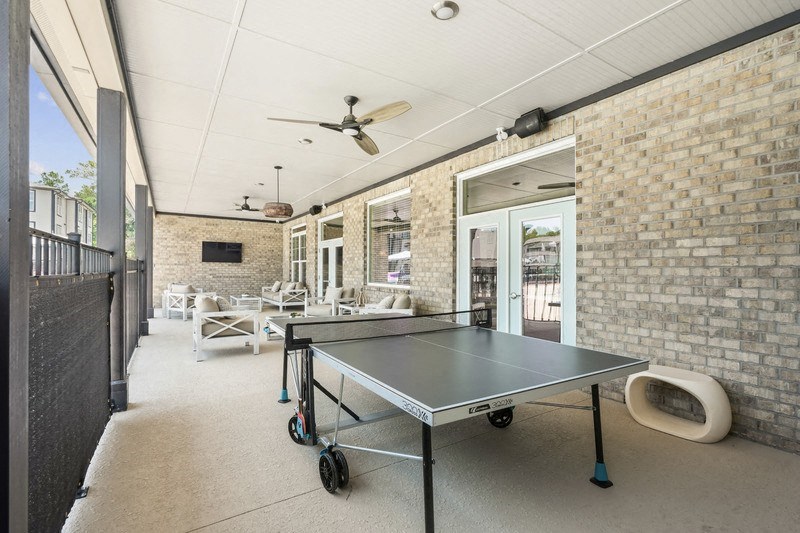 the preserve at ballantyne commons resident game room with ping pong table