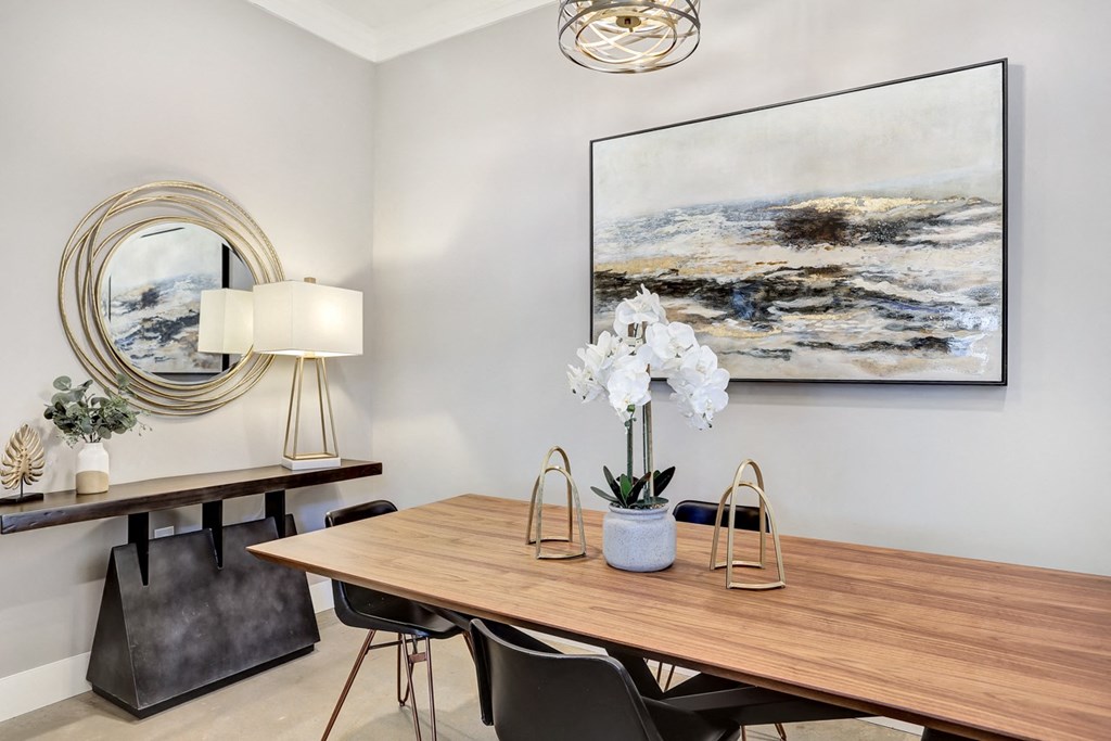 a conference room with a table and chairs