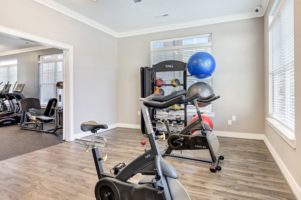 a gym with a stationary bike