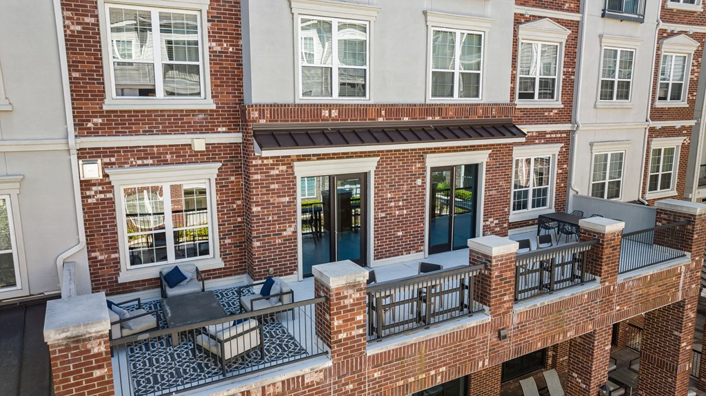 a balcony overlooking the pool
