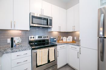 Cue Galatyn Station Kitchen with Sleek White Finish