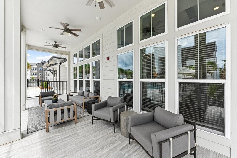 the preserve at ballantyne commons spacious living room with windows and furniture