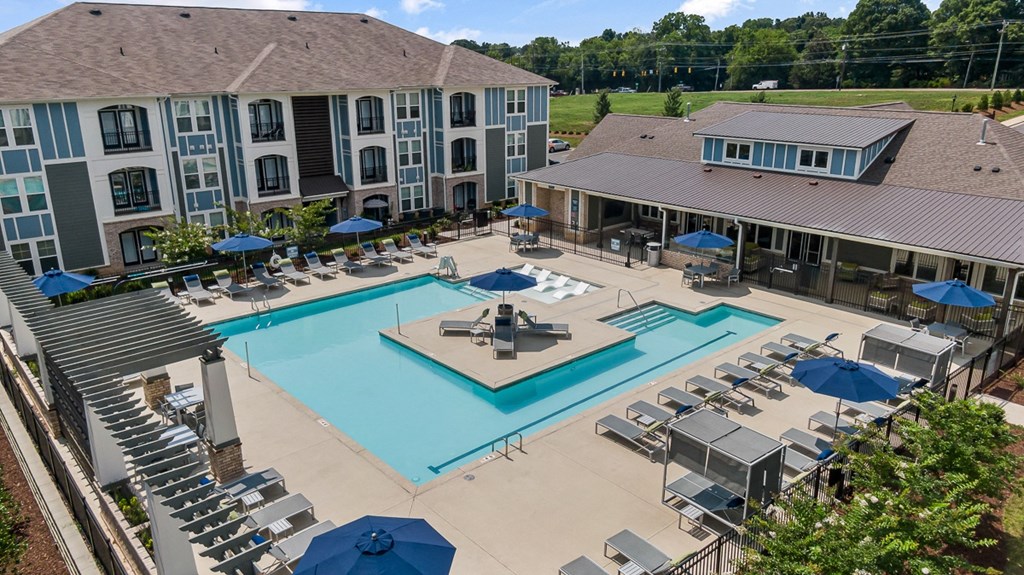 Aerial view of pool and apartment building