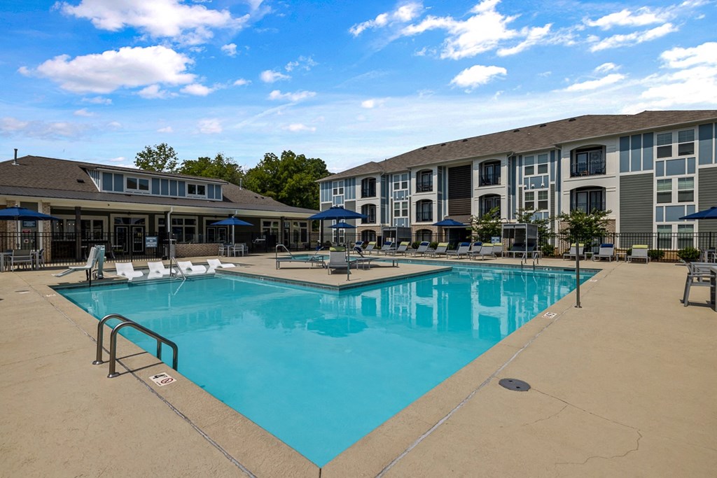 Swimming pool with poolchairs