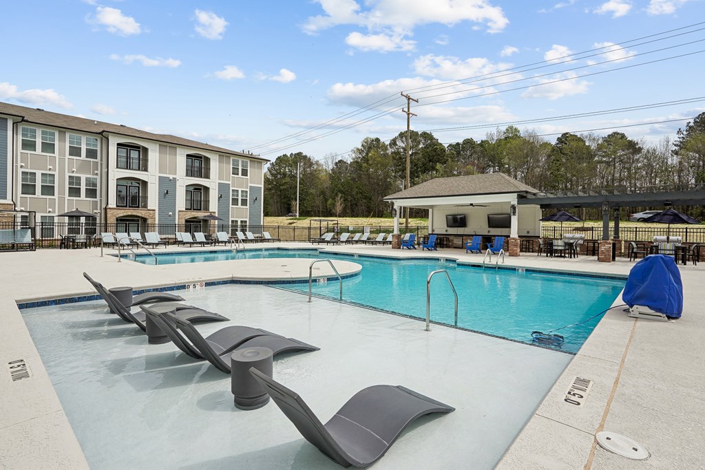 our apartments have a resort style pool with lounge chairs