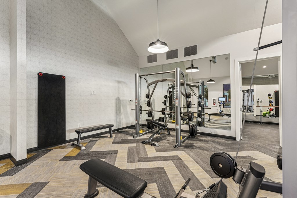 the gym at the flats at big tex apartments
