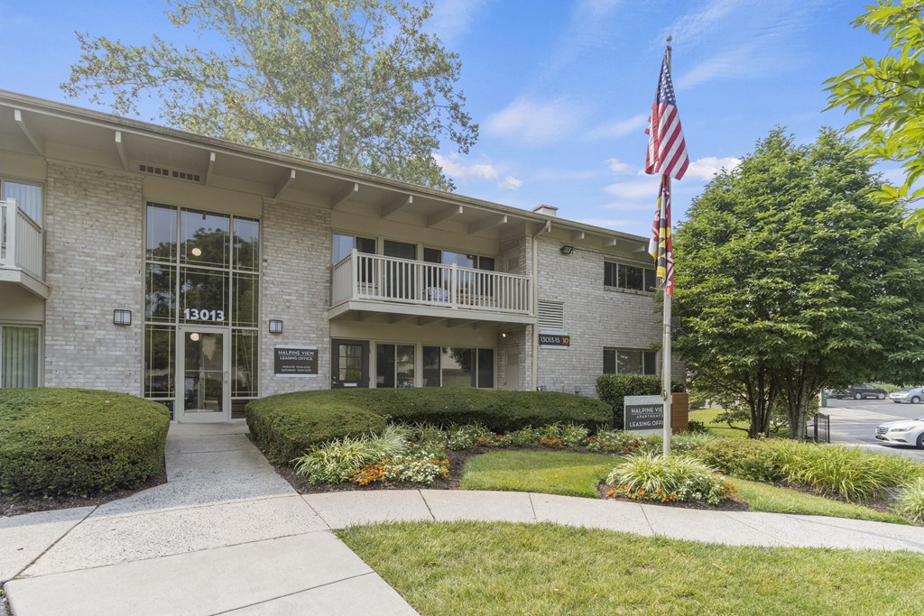 a building with an american flag in front of it