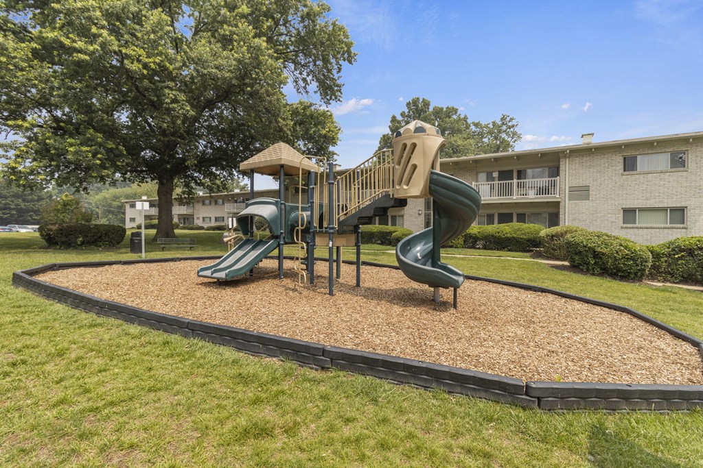 a playground at the whispering winds apartments in pearland, tx