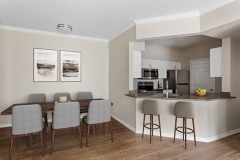 a living room with a dining room and a kitchen