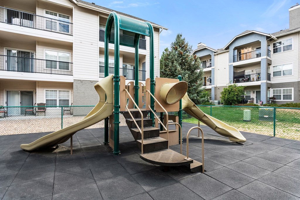 our apartments have a playground with a slide and climbing equipment