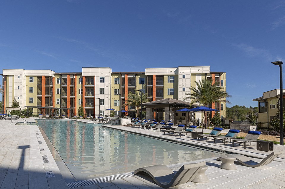 Poolside Sundeck With Relaxing Chairs at Integra Sunrise Parc, Florida