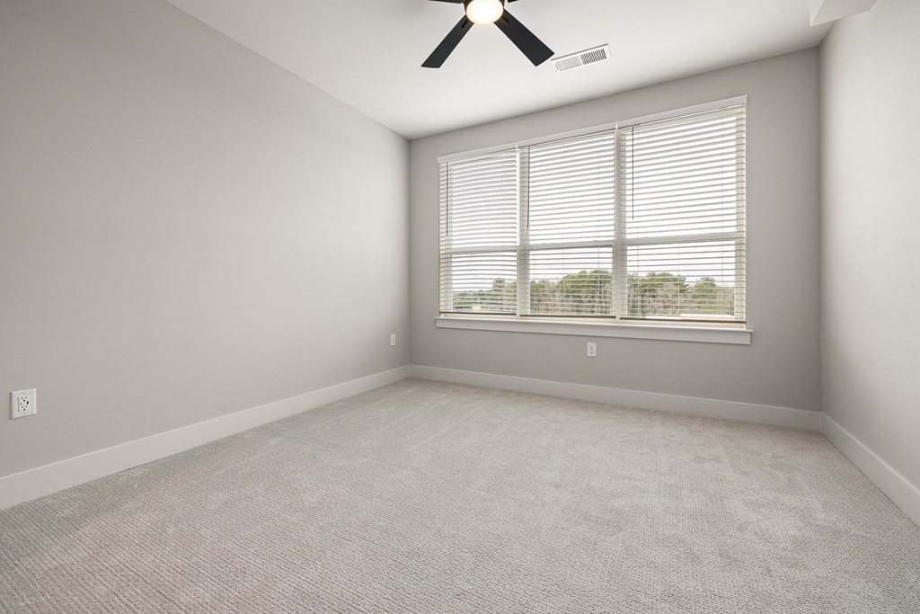 bedroom with large windows