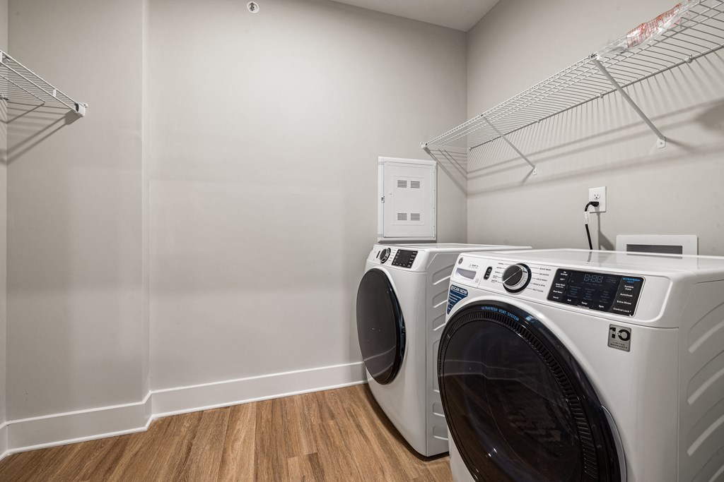 washer and dryer wooden floor