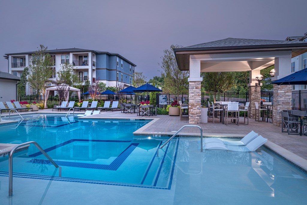 our apartments have a resort style pool at dusk