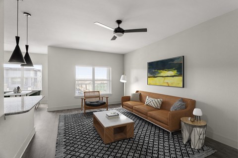 a living room with a brown couch and a coffee table
