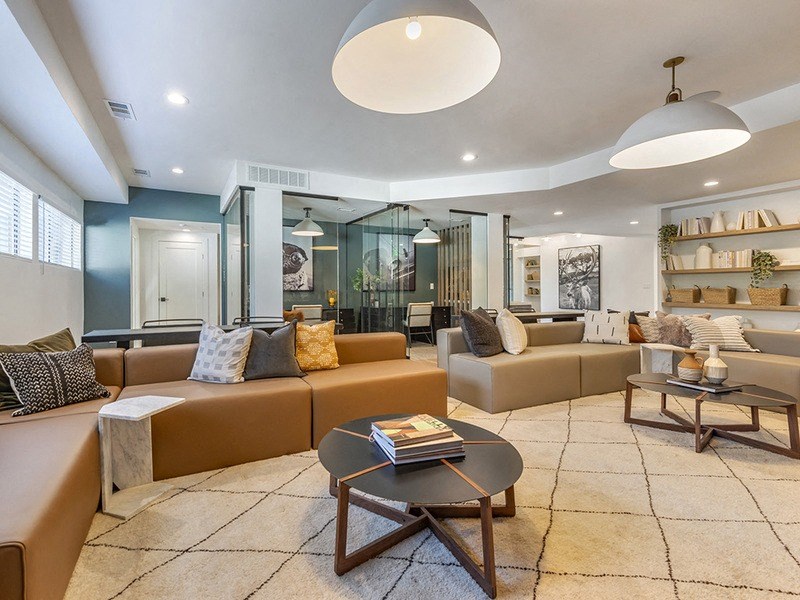 a living room with couches and a coffee table