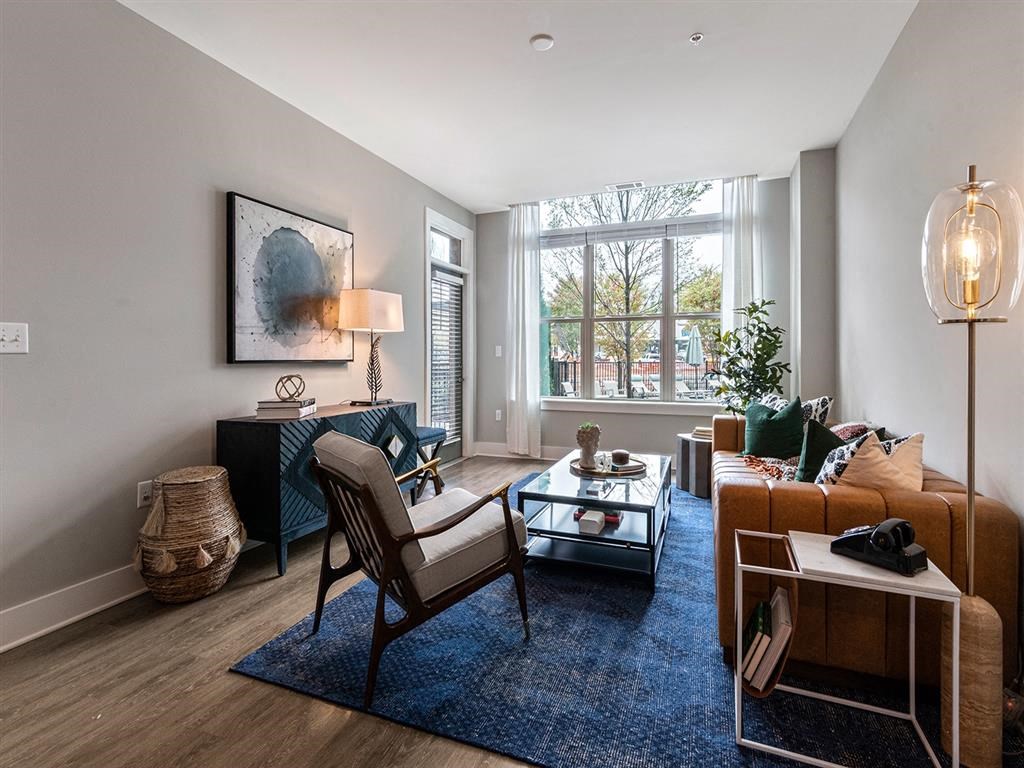 a living room with a couch and a table