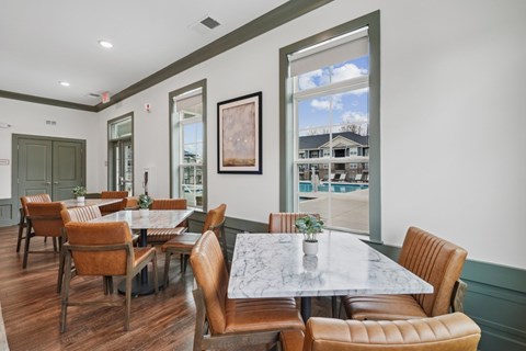 White and grey tables with brown chairs