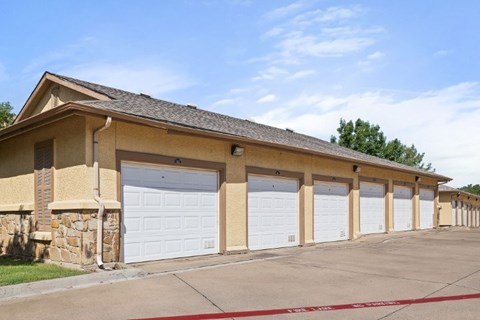 A building with a row of garage doors.