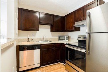 model kitchen with stainless steel appliances