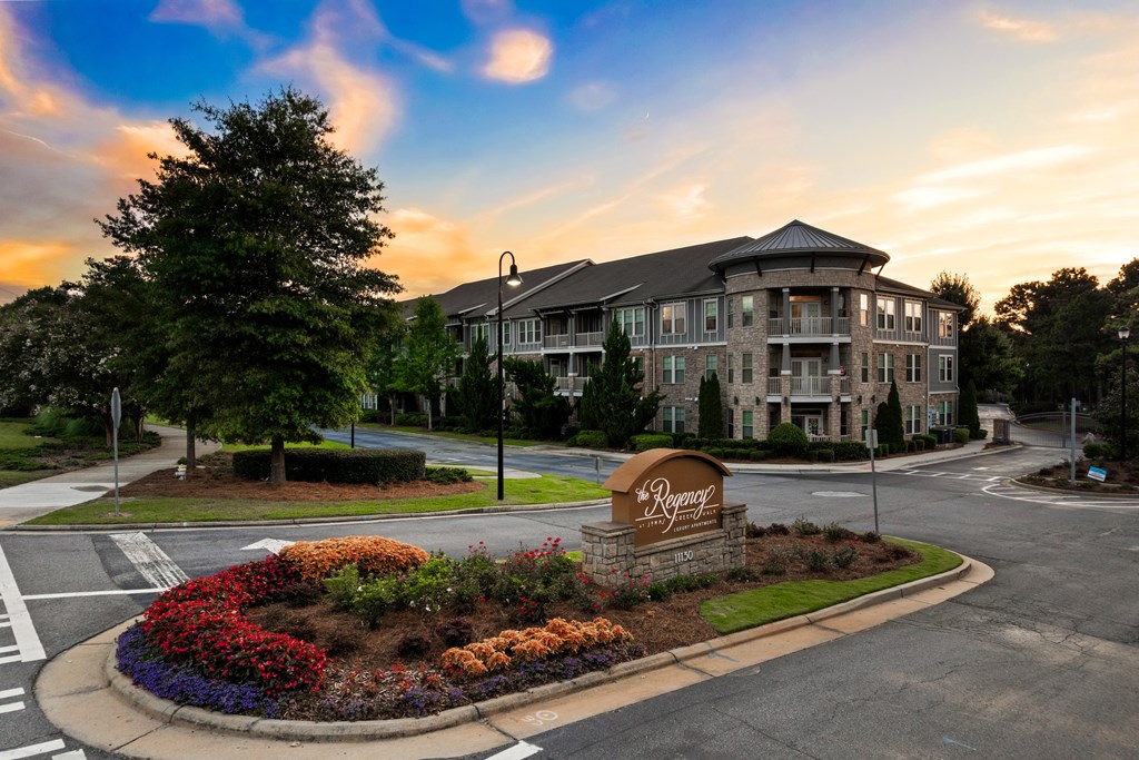 A large building with a sign that says "Bedford" in front of it.