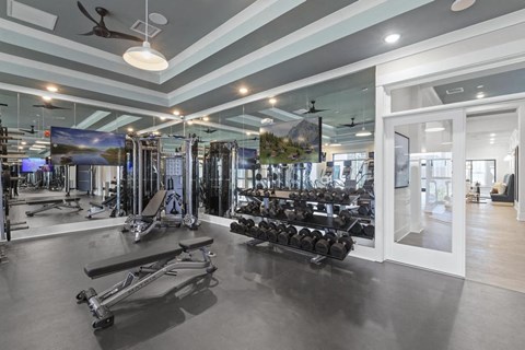 fitness center has dumbbell section