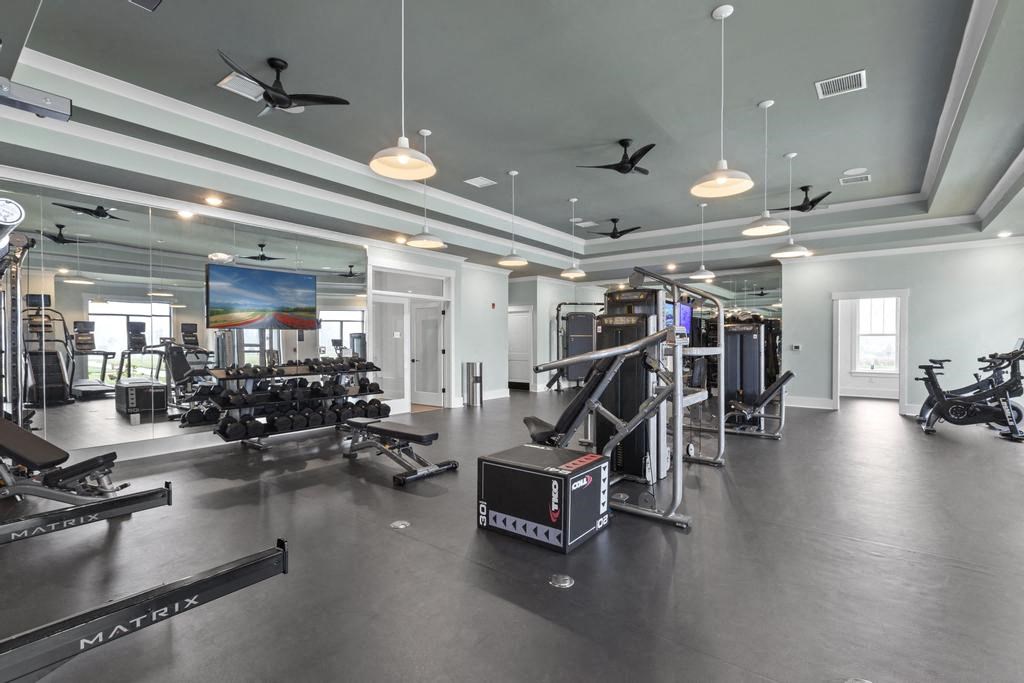 the gym is equipped with weights and other exercise equipment