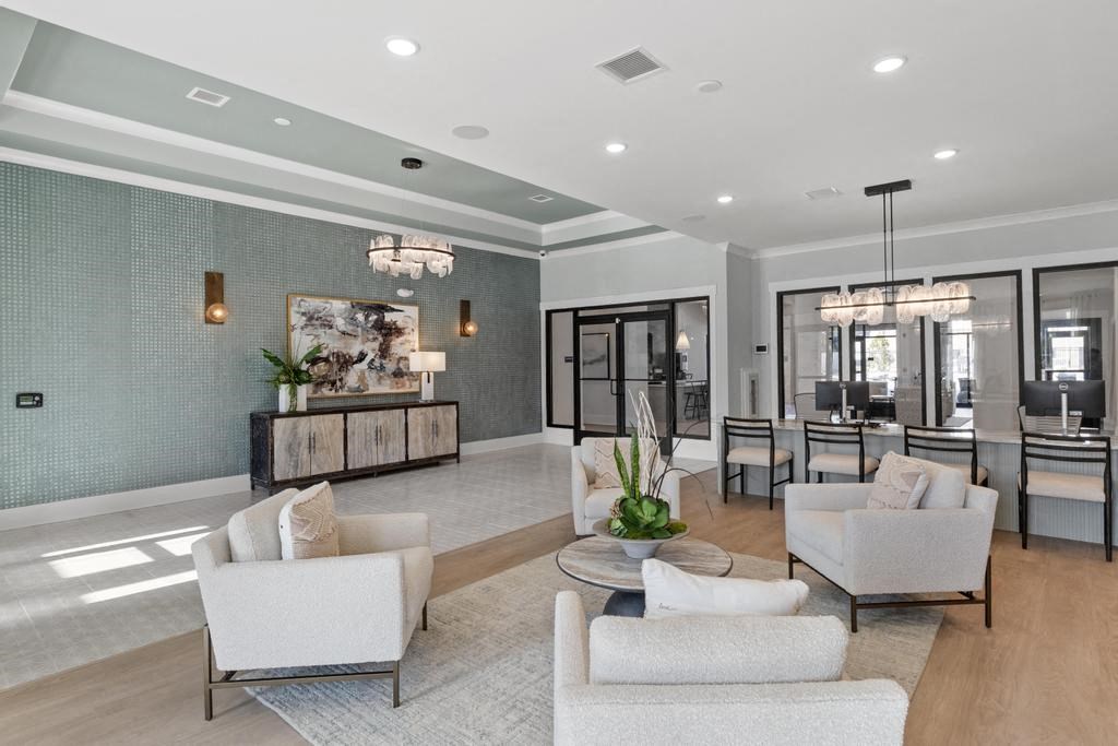 a large living room with a dining room and a kitchen