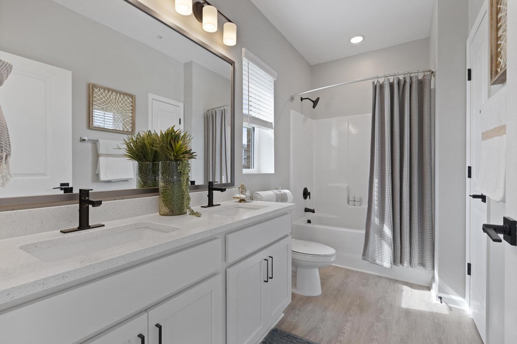 white bathroom with double sinks
