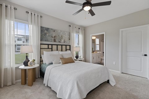 guest bedroom has ceiling fan